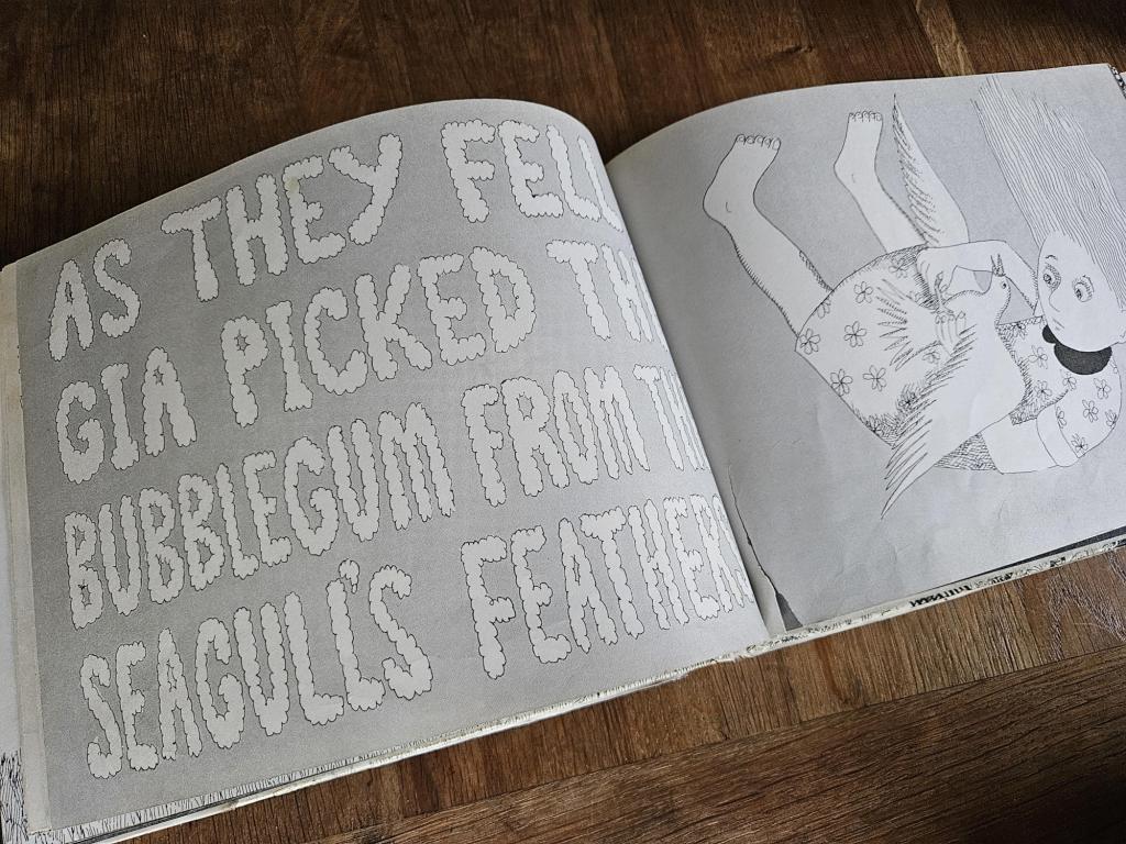 Gia gently picking bubblegum from the seagull’s feathers.